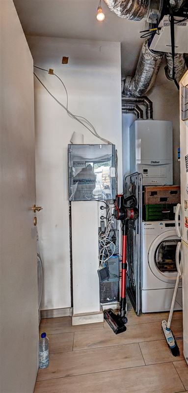 Ruim gelijkvloers appartement met terras en garage