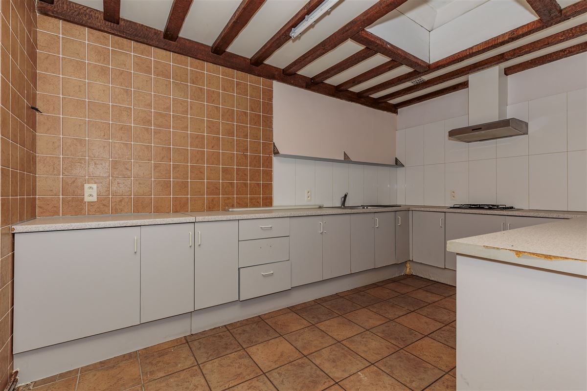Handelsgelijkvloersca 180 m² met tuin van 70 m²