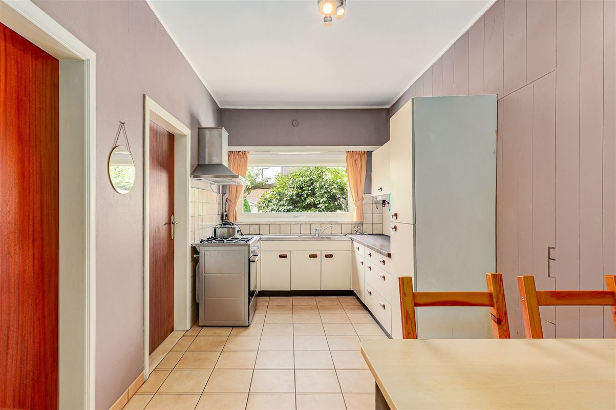 Te renoveren woning met 3 slpk, terras en ruime tuin in Wommelgem!