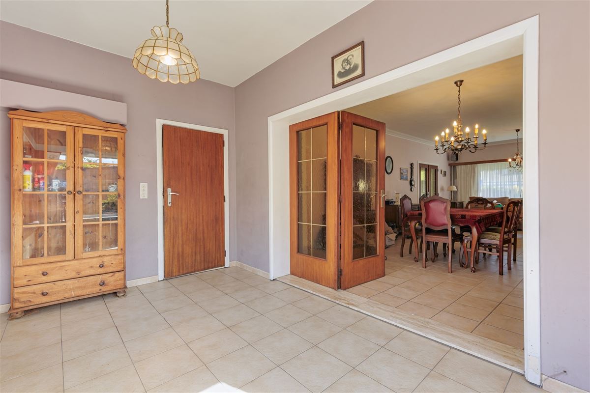 Te renoveren woning met 3 slpk, terras en ruime tuin in Wommelgem!