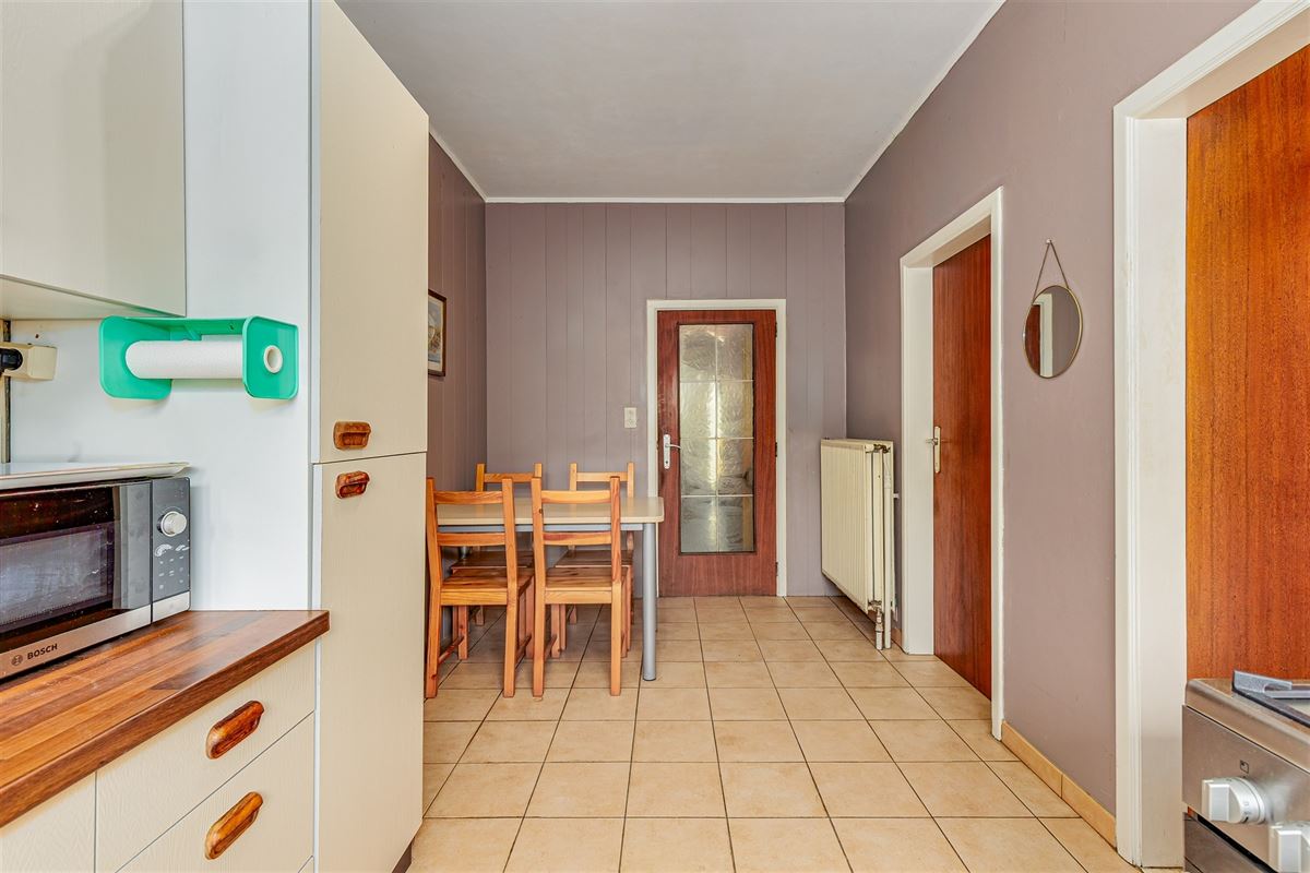 Te renoveren woning met 3 slpk, terras en ruime tuin in Wommelgem!