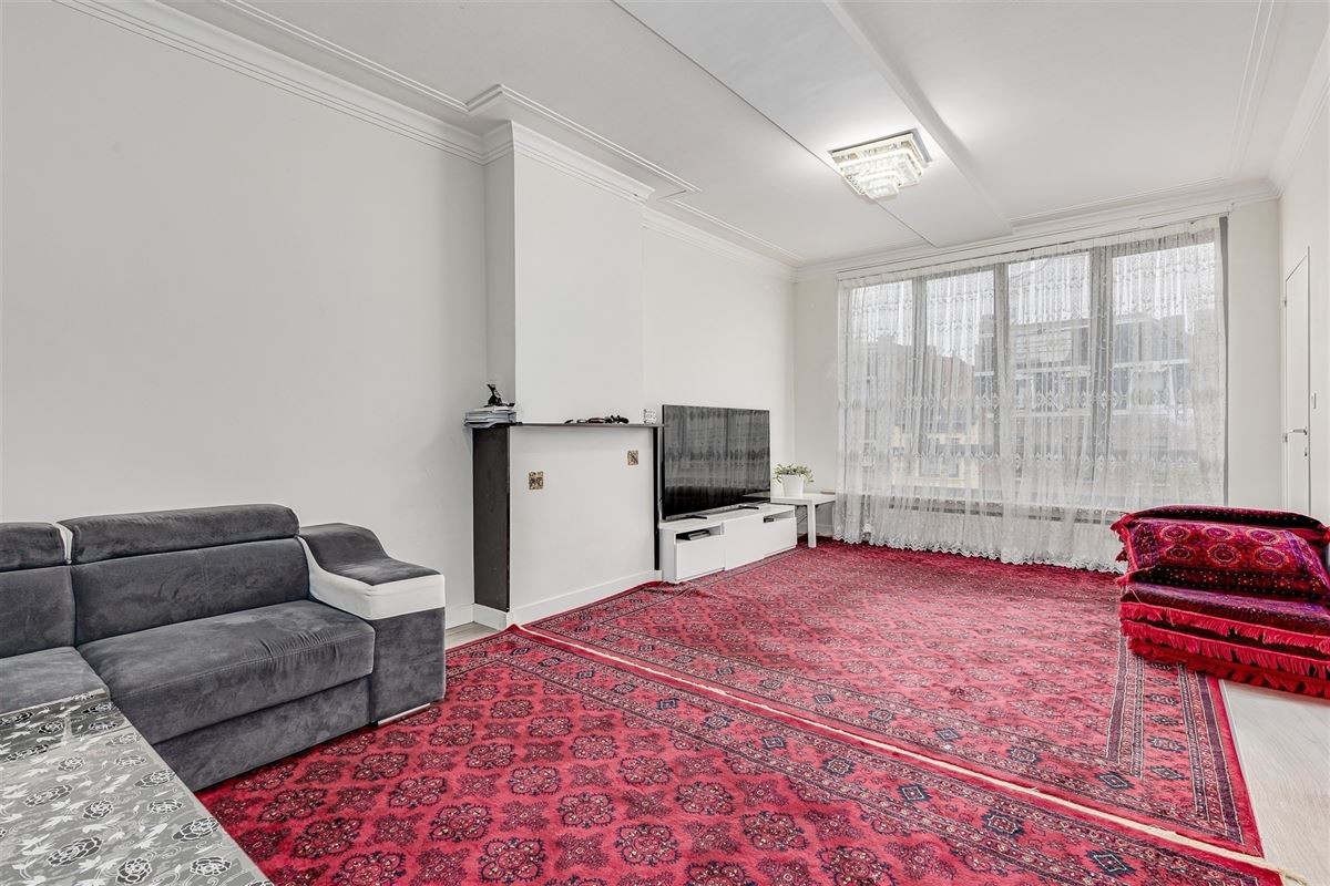 Vergund appartementsgebouw met 3 appt, handelsglvl en tuin in Merksem!