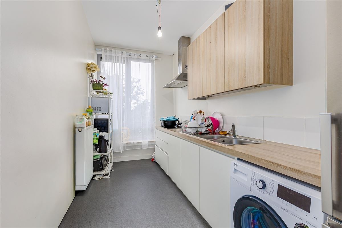 Vergund appartementsgebouw met 3 appt, handelsglvl en tuin in Merksem!
