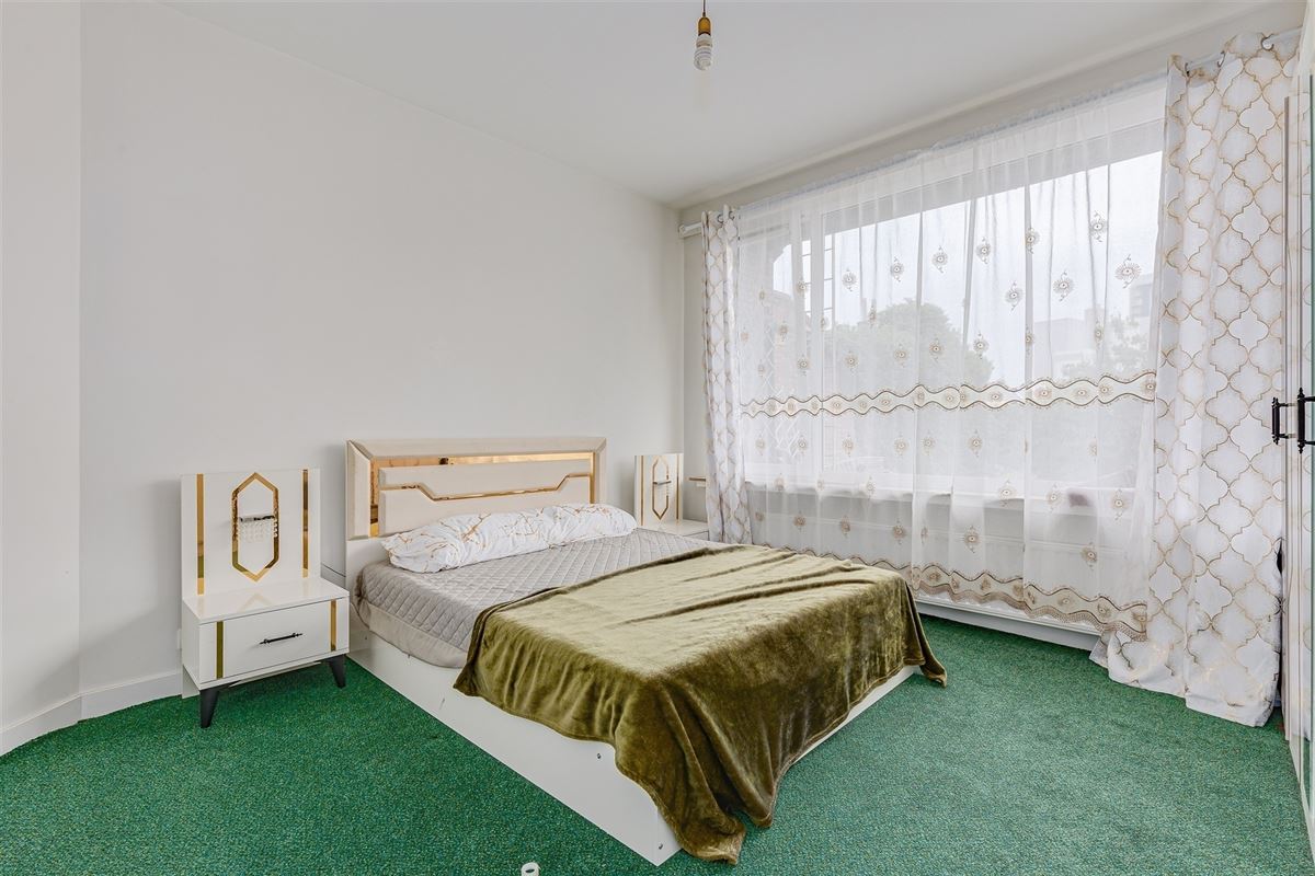 Vergund appartementsgebouw met 3 appt, handelsglvl en tuin in Merksem!