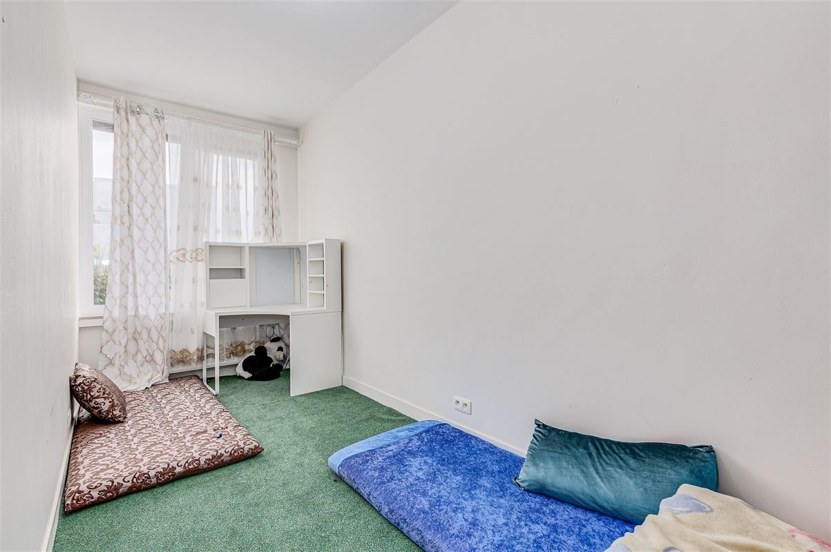 Vergund appartementsgebouw met 3 appt, handelsglvl en tuin in Merksem!