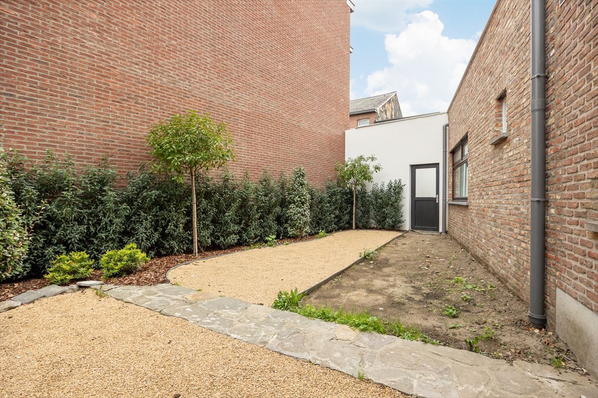 Gezinswoning woning met drie slaapkamers en tuin