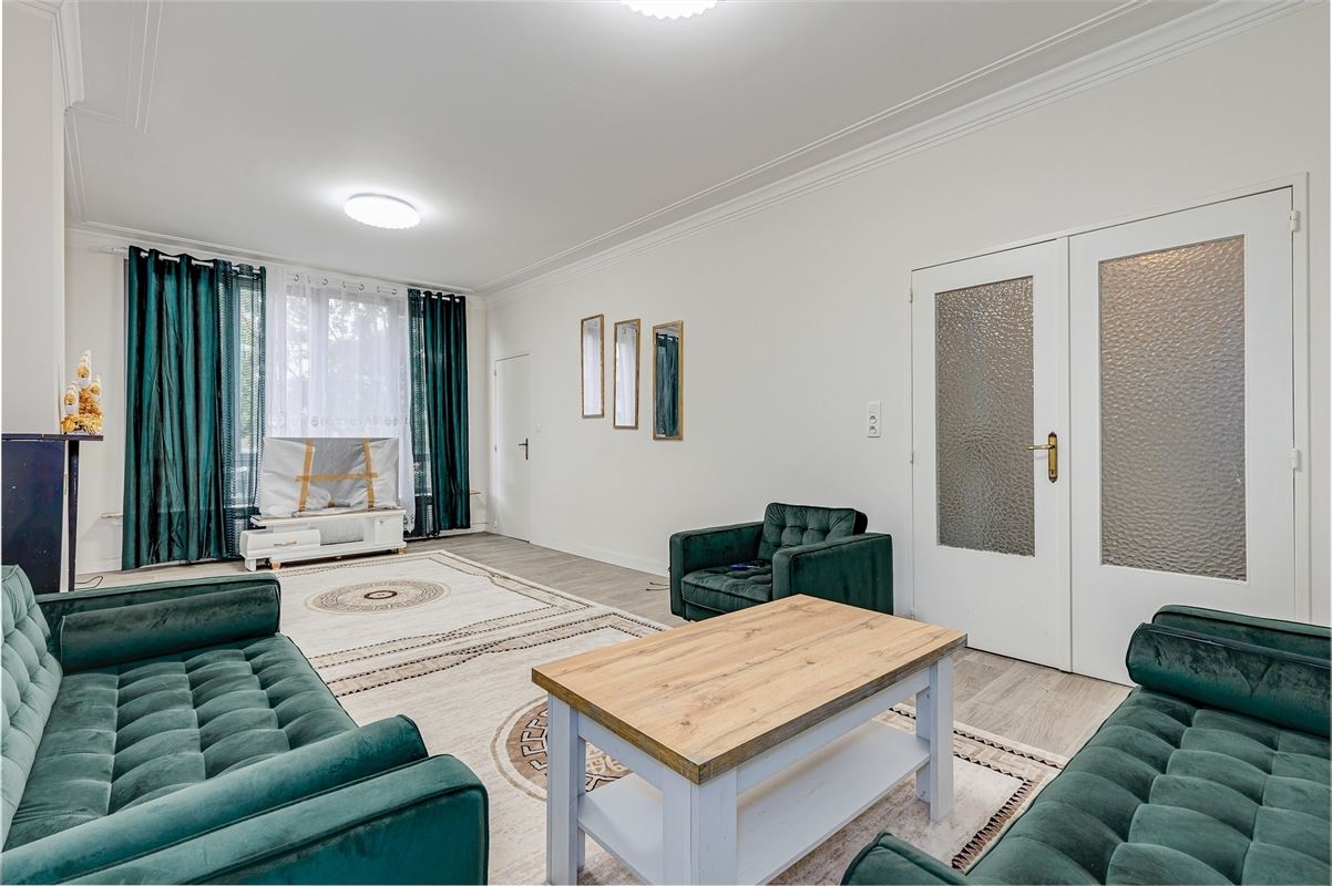 Vergund appartementsgebouw met 3 appt, handelsglvl en tuin in Merksem!