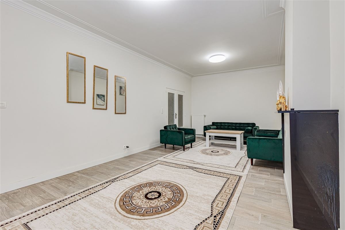 Vergund appartementsgebouw met 3 appt, handelsglvl en tuin in Merksem!