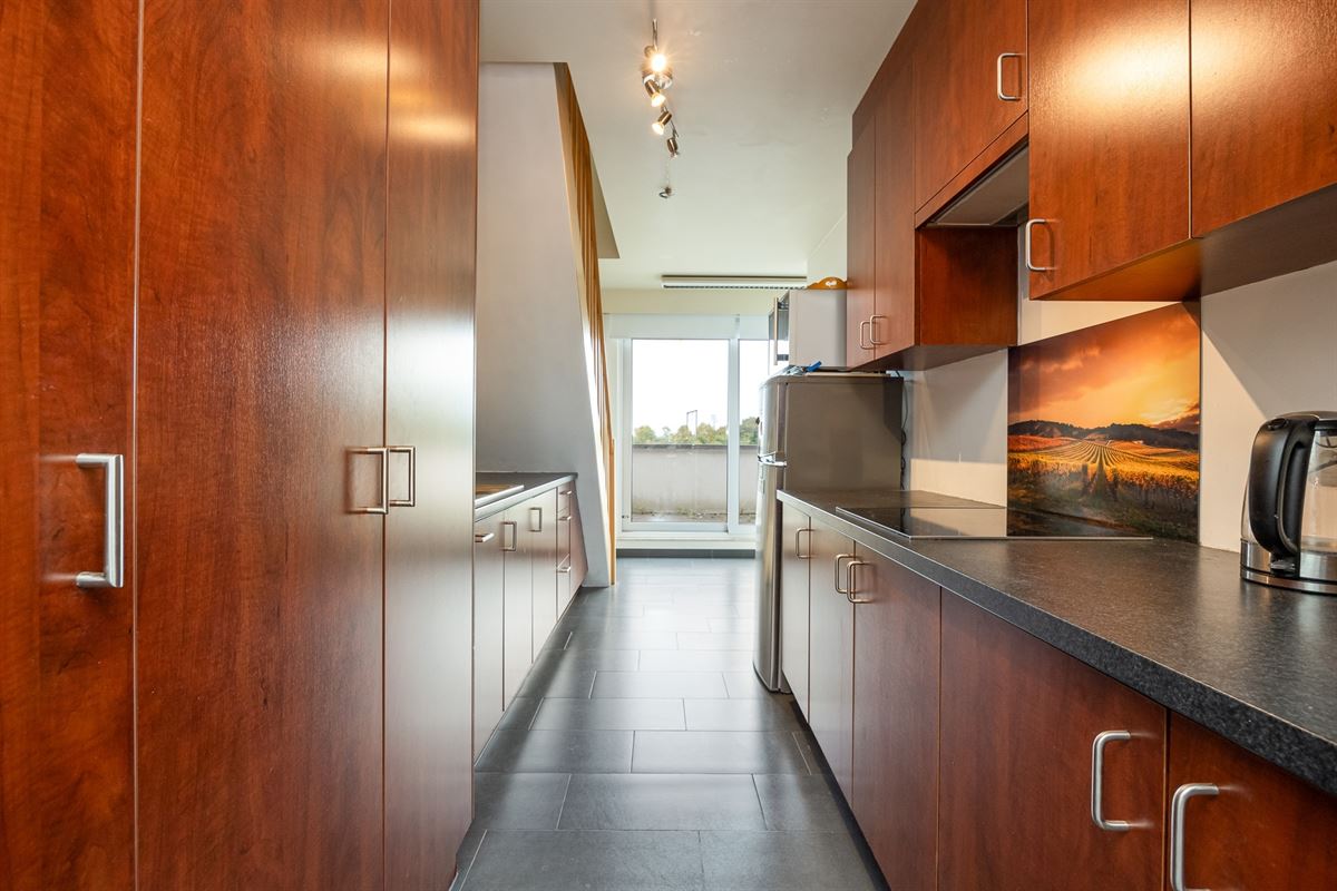Lichtrijke duplex met 3 slaapkamers en 2 terrassen