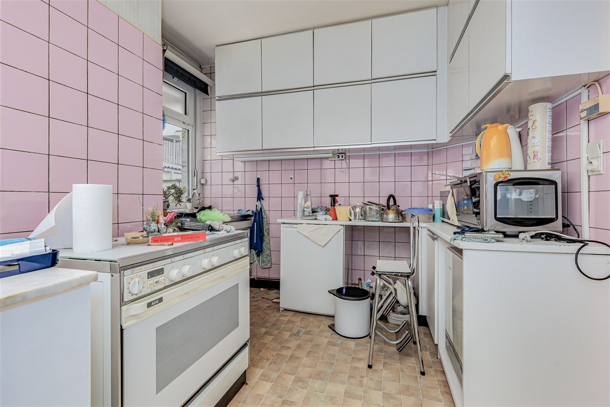 Te renoveren woning met tuin in Merksem