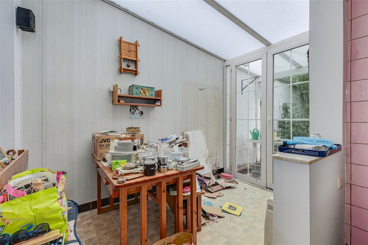 Te renoveren woning met tuin in Merksem