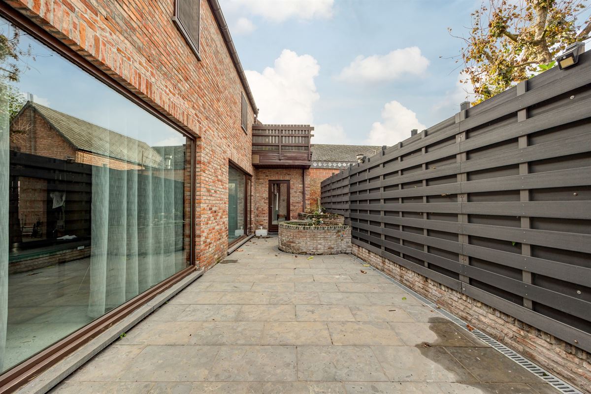 Ruime woonst, polyvalente ruimte, studio en garage