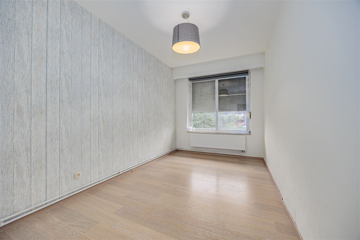 Uniek hoekperceel met handelshuis + garage + appt