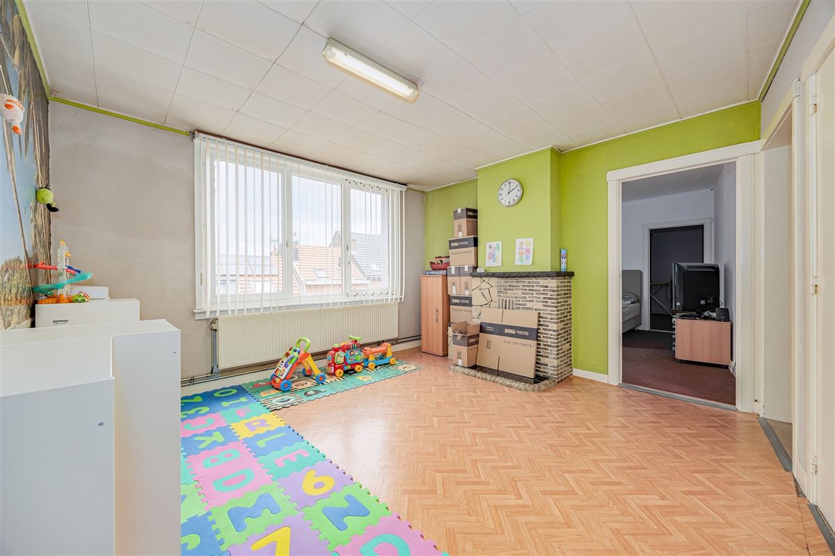 Uniek hoekperceel met handelshuis + garage + appt