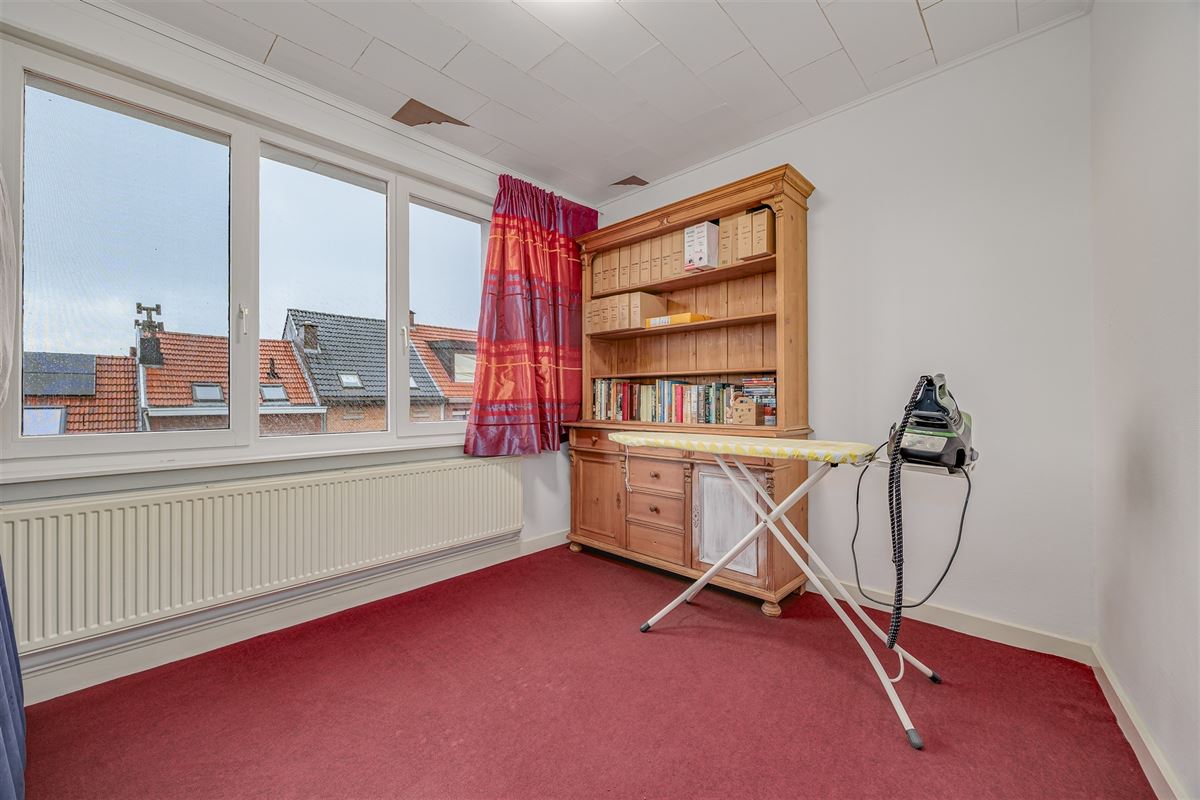 Uniek hoekperceel met handelshuis + garage + appt