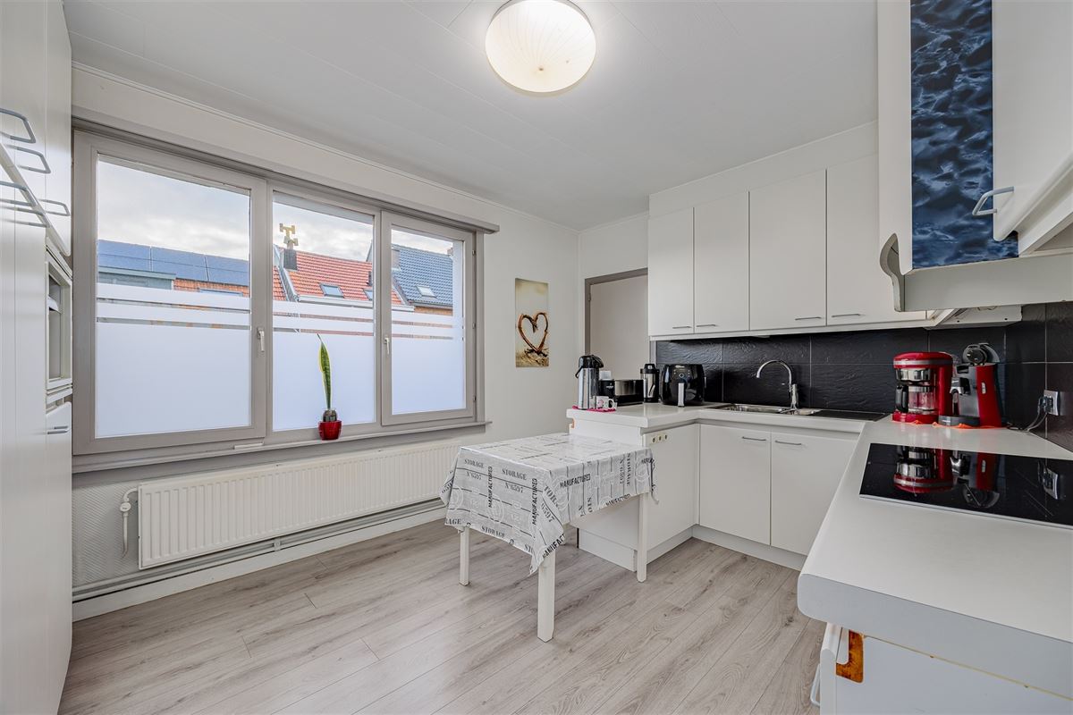 Uniek hoekperceel met handelshuis + garage + appt