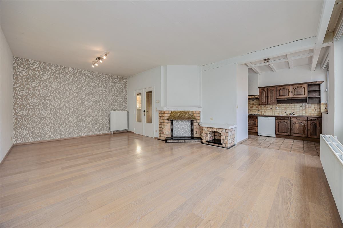 Uniek hoekperceel met handelshuis + garage + appt