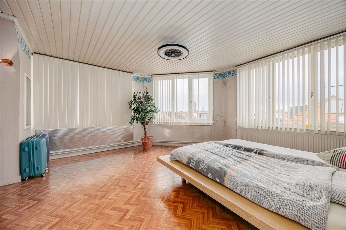 Uniek hoekperceel met handelshuis + garage + appt