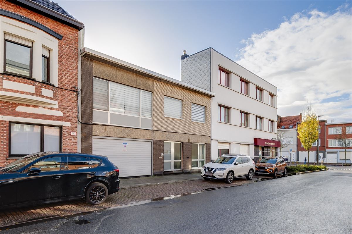 Uniek hoekperceel met handelshuis + garage + appt