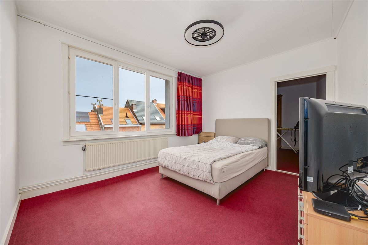 Uniek hoekperceel met handelshuis + garage + appt