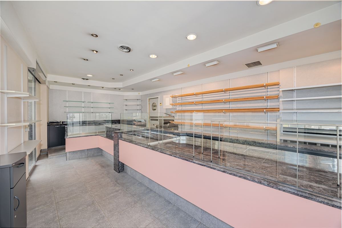 Uniek hoekperceel met handelshuis + garage + appt