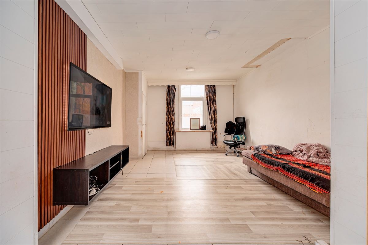 Te renoveren woning met 3 slaapkamers op centrale locatie