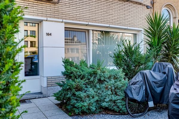 Prachtig gelijkvloers appartement met 1 slaapkamer, zonnige tuin en polyvalente ruimte!