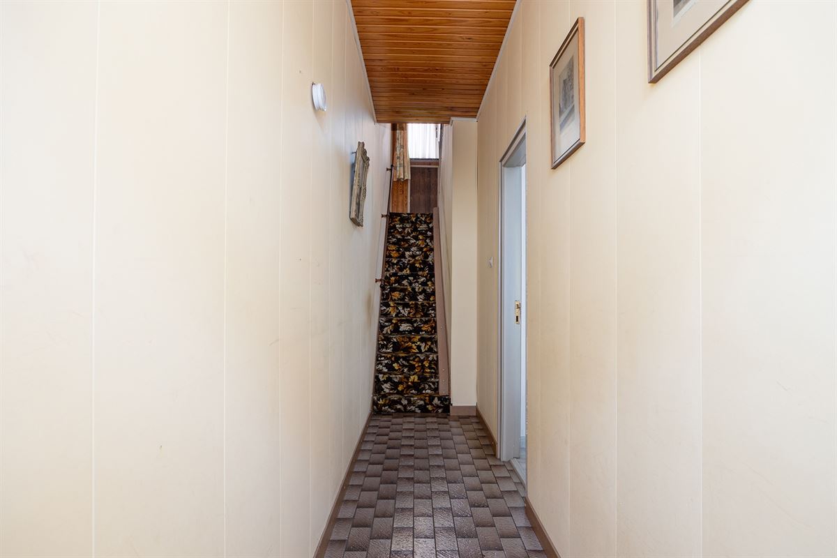Gezinswoning met drie slaapkamers, tuin en garage