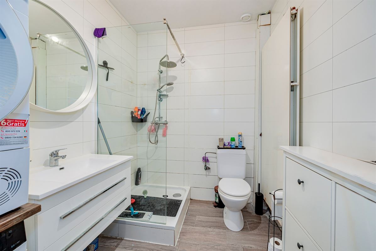Opbrengsteigendom - comm. glvl met 4 appartementsgebouw