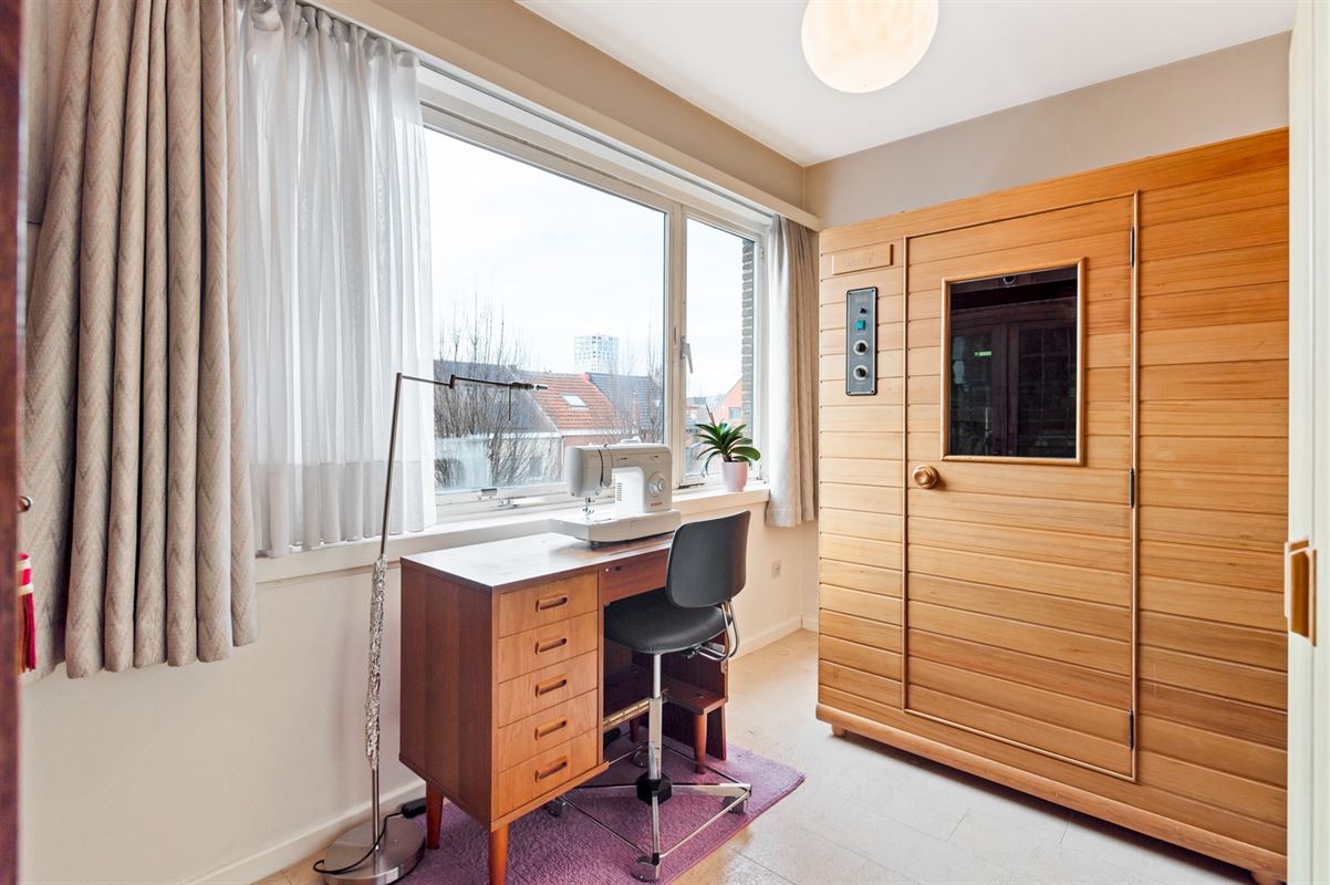 Maison de plain-pied avec 3 chambres à coucher et portail de jardin côté rue.