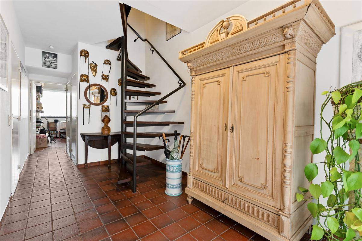 Maison de plain-pied avec 3 chambres à coucher et portail de jardin côté rue.