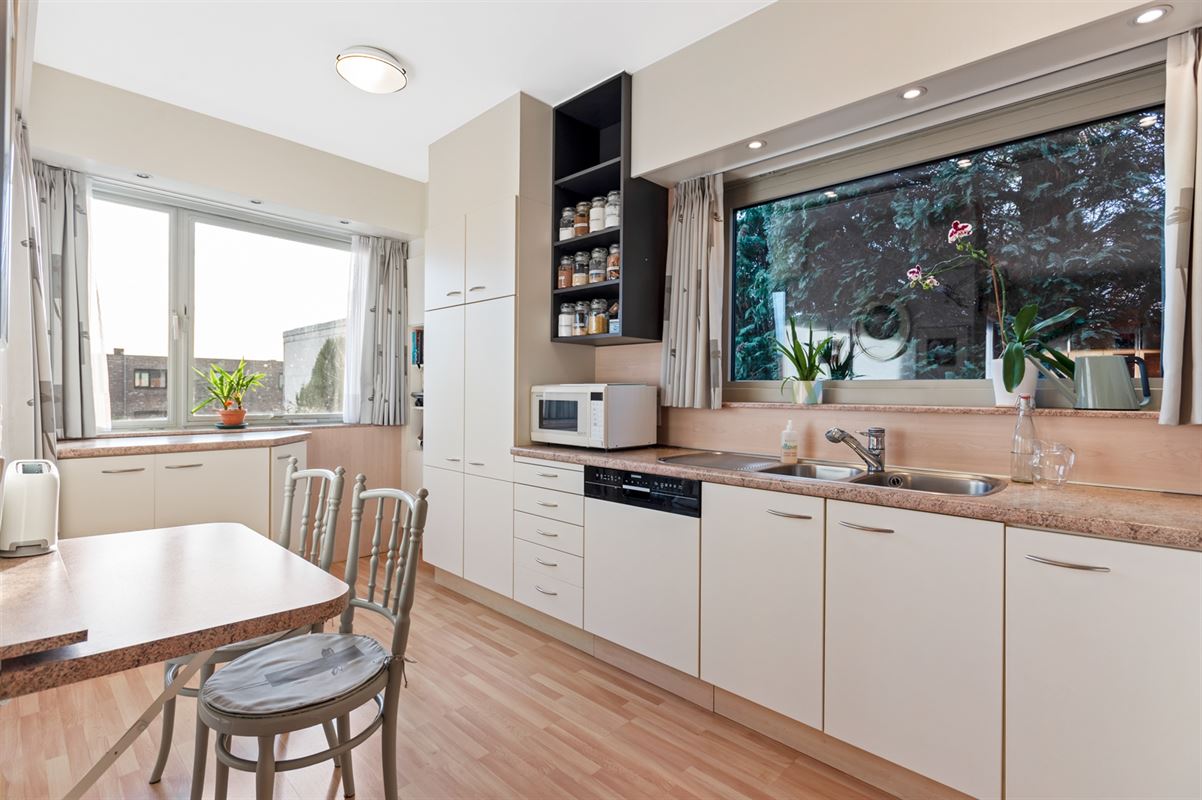 Maison de plain-pied avec 3 chambres à coucher et portail de jardin côté rue.