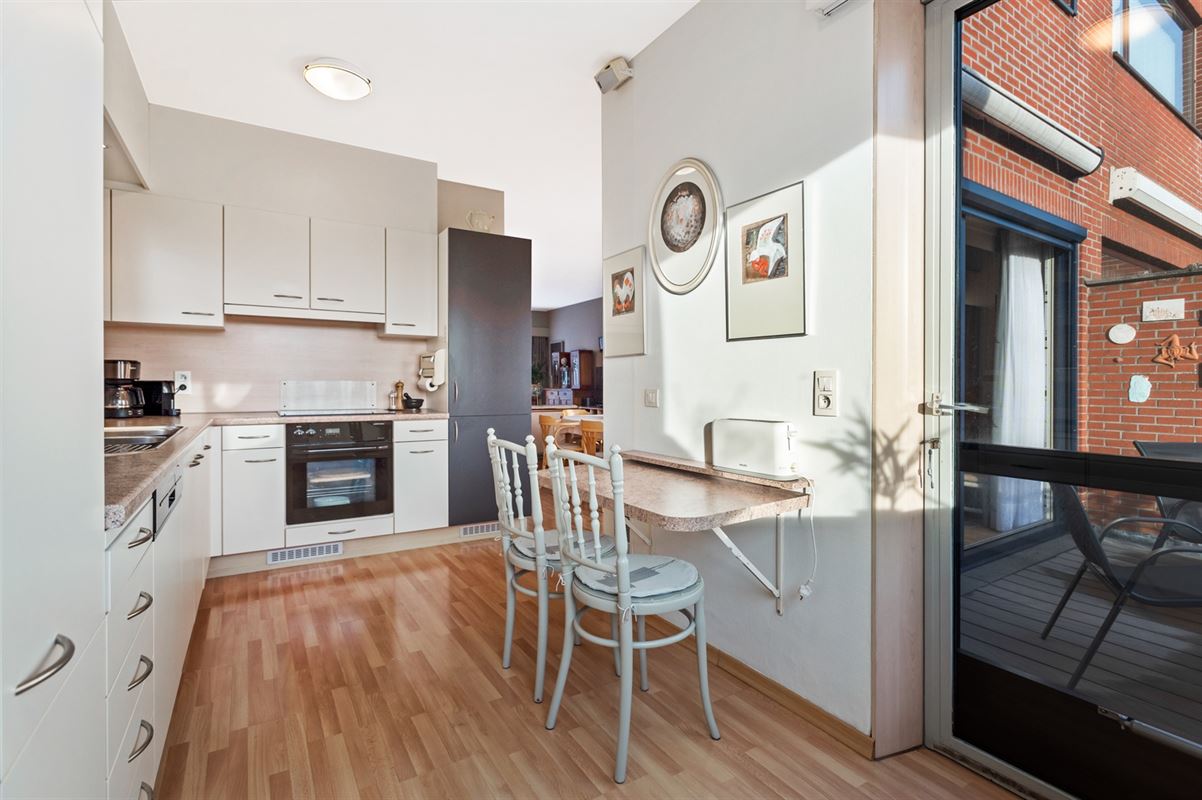 Maison de plain-pied avec 3 chambres à coucher et portail de jardin côté rue.