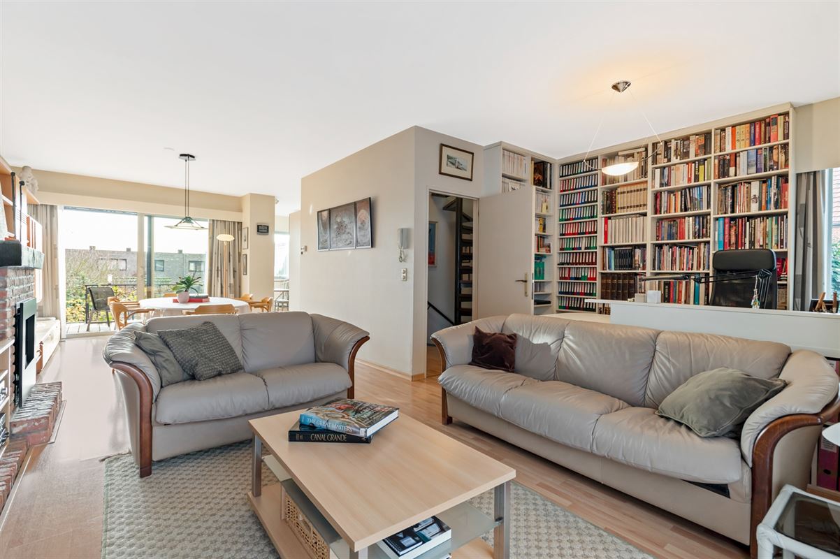 Maison de plain-pied avec 3 chambres à coucher et portail de jardin côté rue.