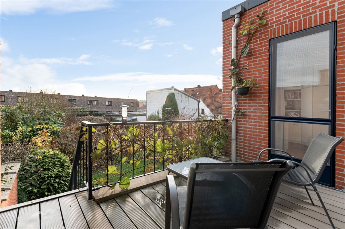 Maison de plain-pied avec 3 chambres à coucher et portail de jardin côté rue.
