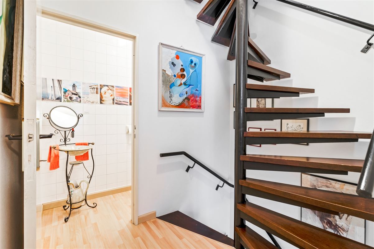 Maison de plain-pied avec 3 chambres à coucher et portail de jardin côté rue.