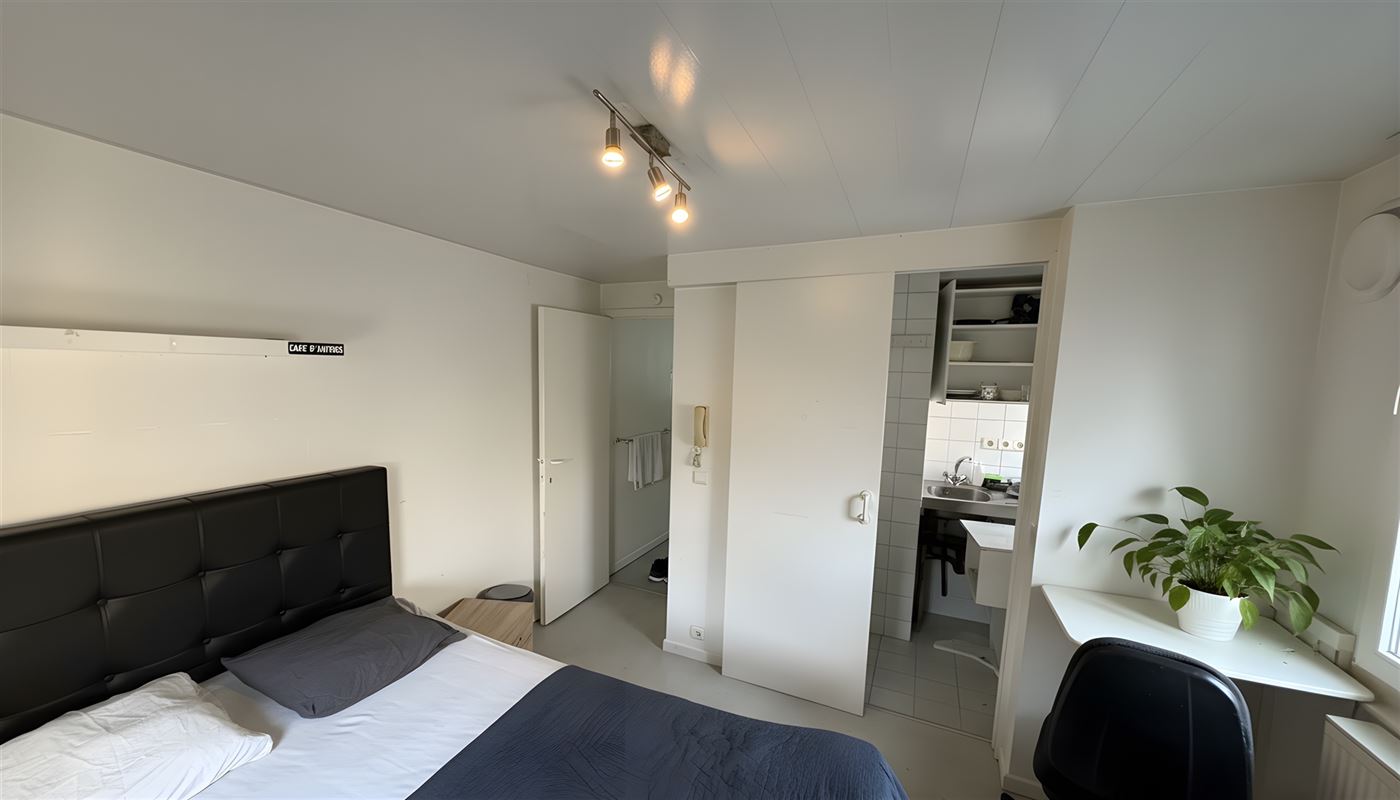 Kamerwoning met 6 kamers en handelsgelijkvloers.