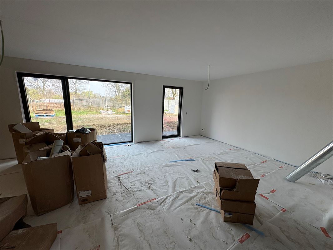Gelijkvloersappartement met 2 slaapkamers en tuin.
