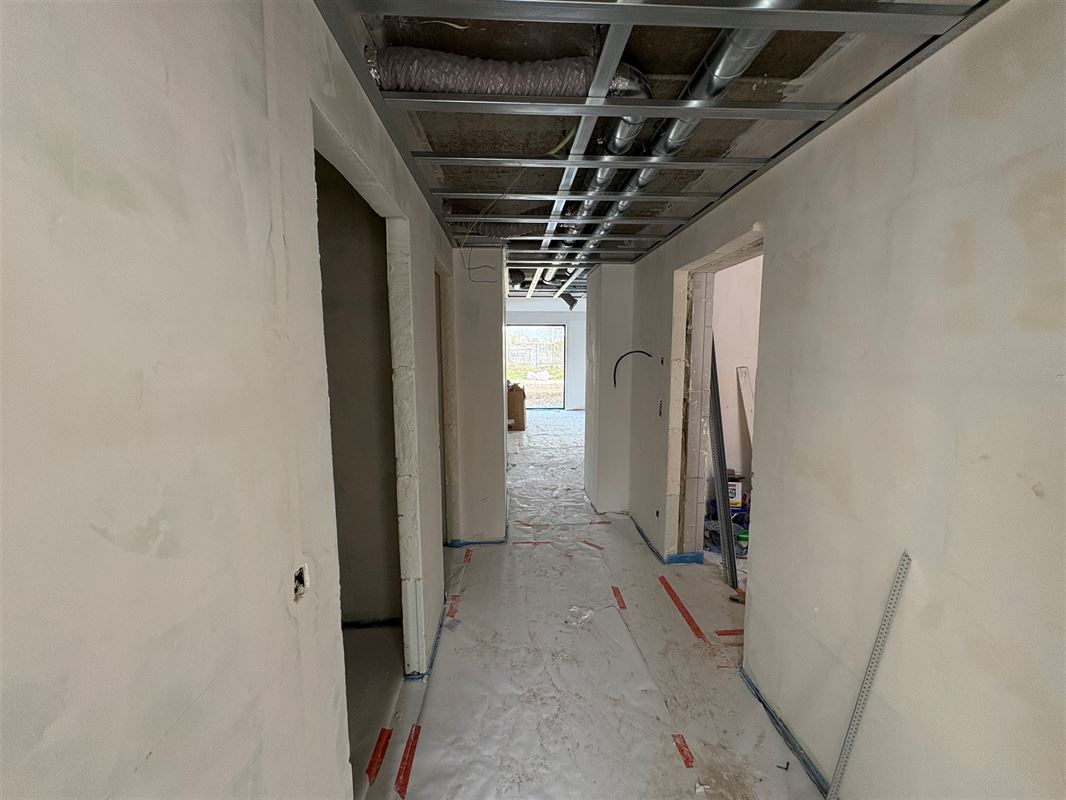 Gelijkvloersappartement met 2 slaapkamers en tuin.