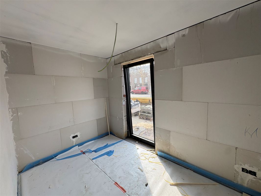 Gelijkvloersappartement met 3 slaapkamers en tuin.