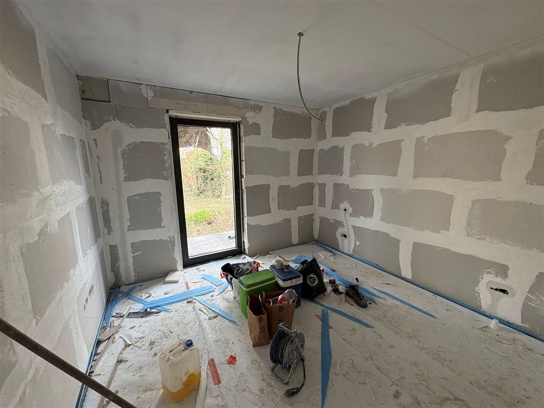 Gelijkvloersappartement met 3 slaapkamers en tuin.