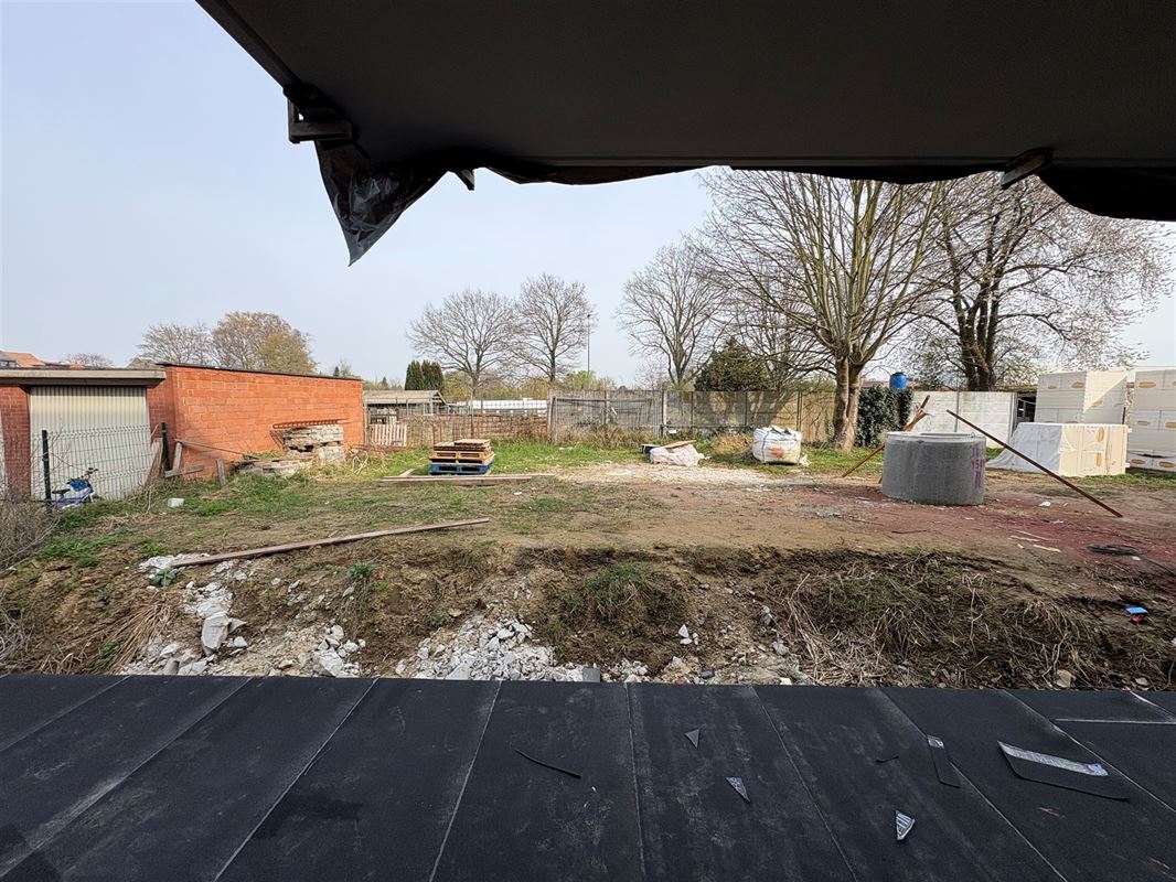 Gelijkvloersappartement met 2 slaapkamers en tuin.