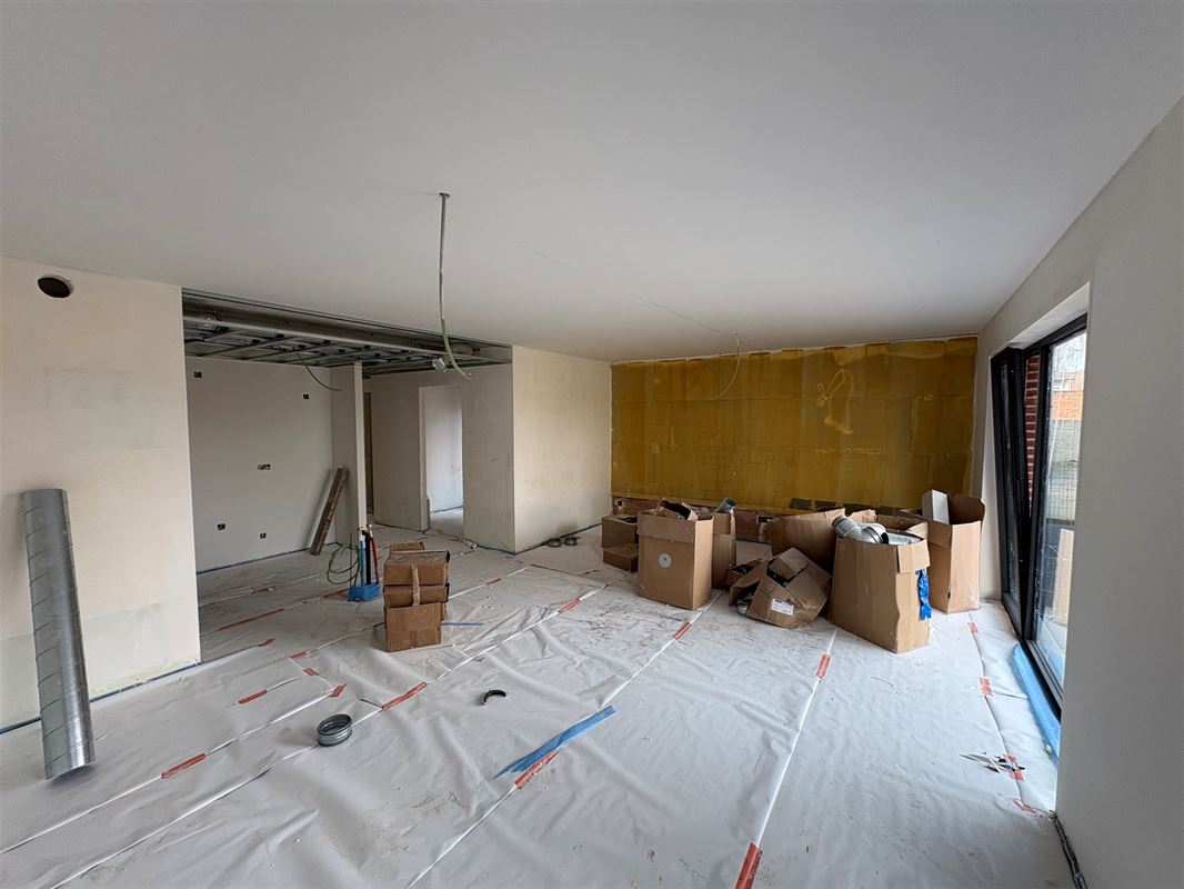 Gelijkvloersappartement met 2 slaapkamers en tuin.