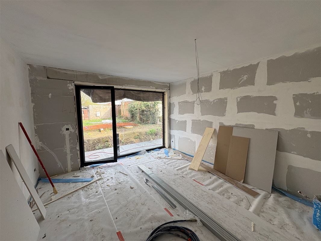 Gelijkvloersappartement met 3 slaapkamers en tuin.