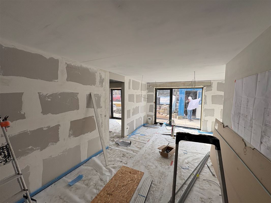 Gelijkvloersappartement met 3 slaapkamers en tuin.