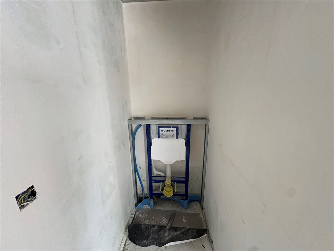Gelijkvloersappartement met 3 slaapkamers en tuin.