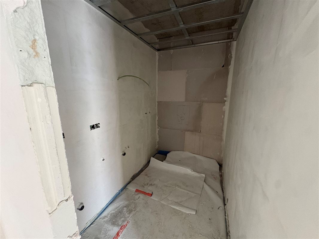 Gelijkvloersappartement met 3 slaapkamers en tuin.