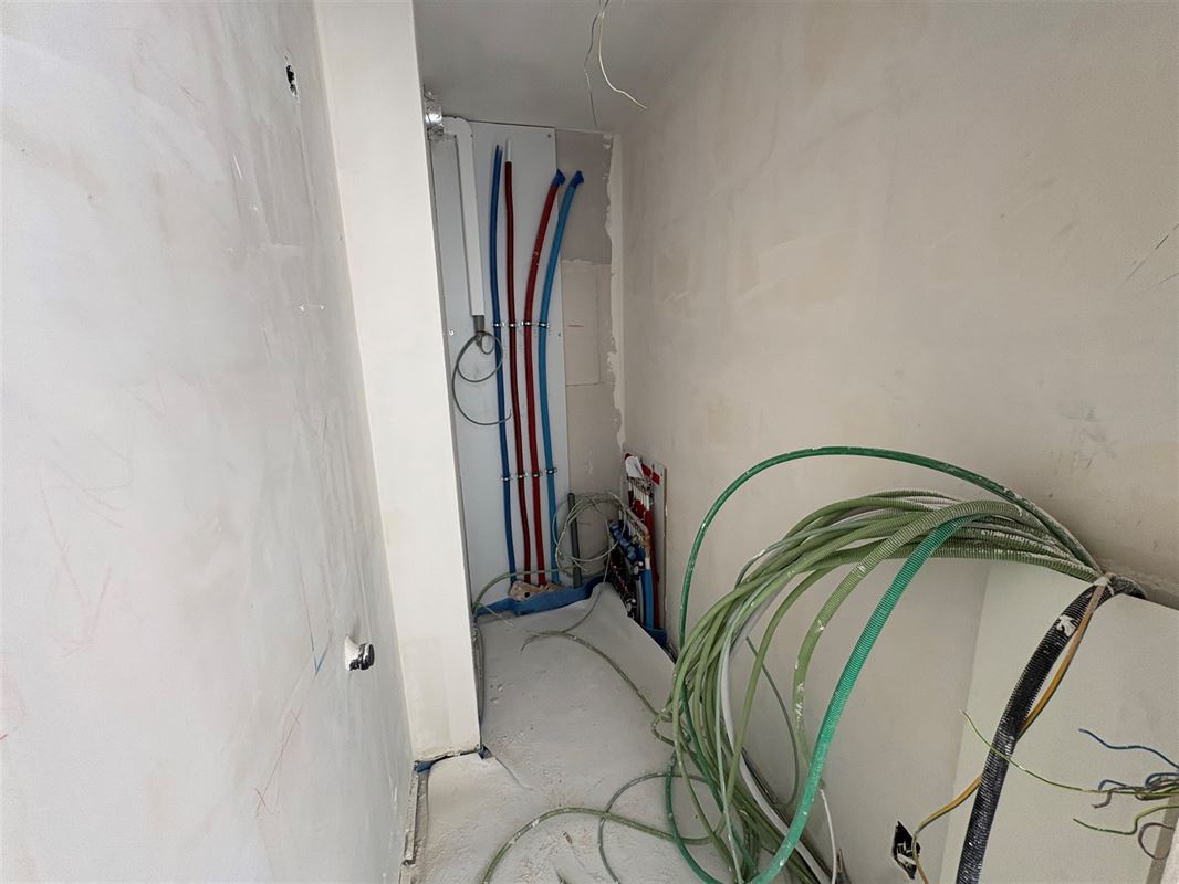 Gelijkvloersappartement met 3 slaapkamers en tuin.