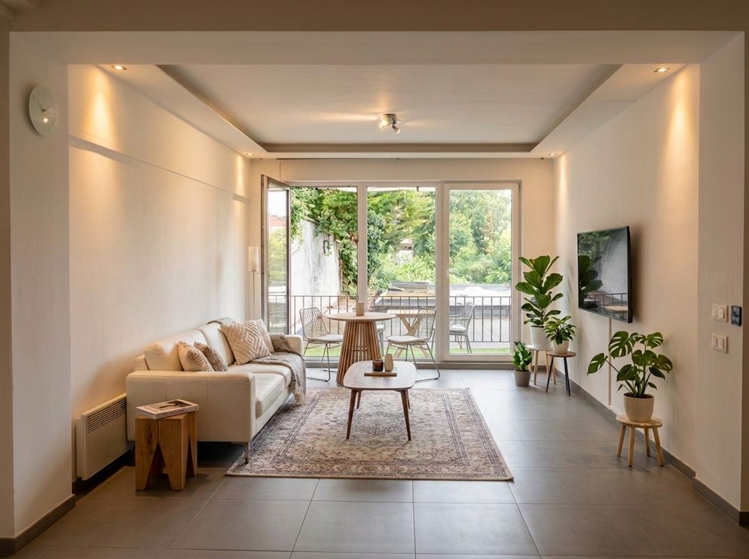 Ruime appartement met zalig terras nabij Centraal Station.