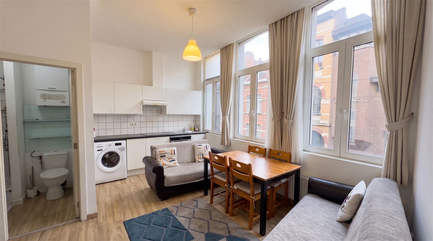 Rendabele opbrengsteigendom met 3 appartementen en handel.